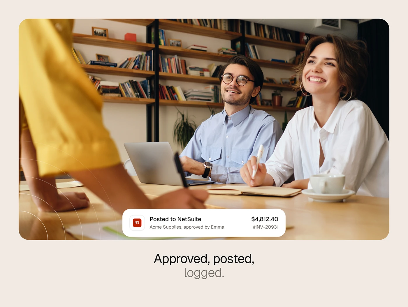 Approved invoice posted to the ERP over a photo of a smiling team at a table